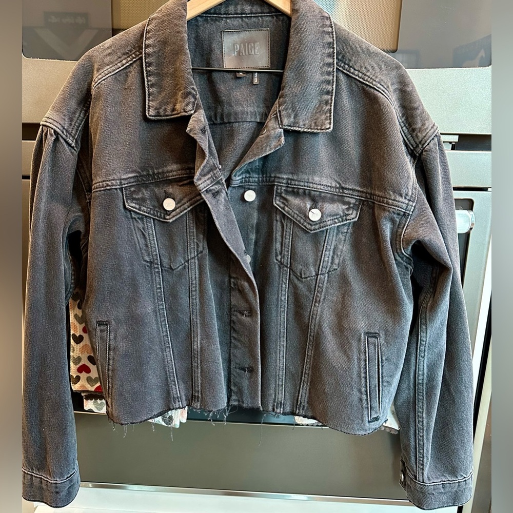 PAIGE faded black jean jacket, raw edge on bottom hem, size XL